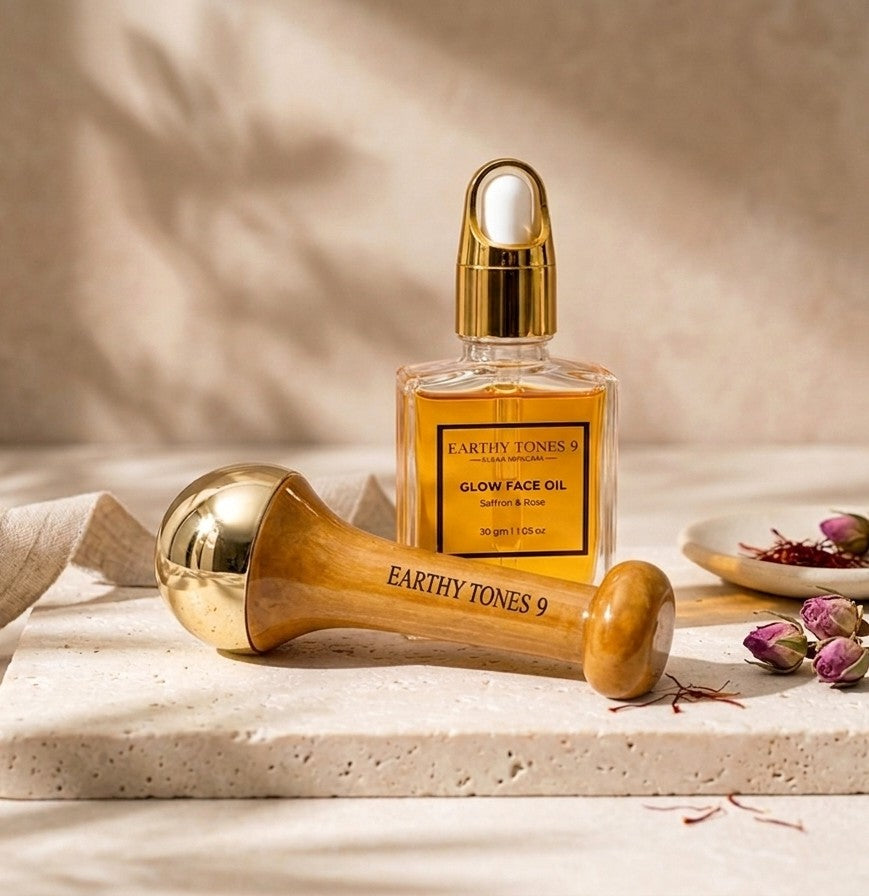 Earthy Tones 9 Glow Face Oil bottle with kansa wooden applicator on a neutral background